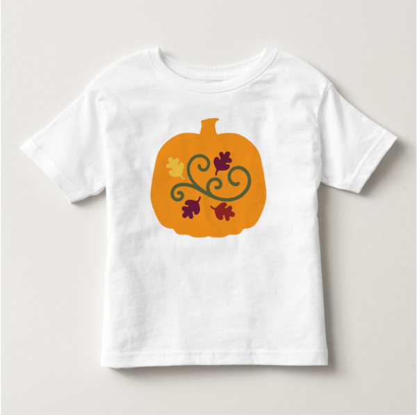 A toddler will be excited to get a new pumpkin t-shirt from you. The t-shirt is decorated with a pumpkin, leaves, and a vine. Colors are orange, yellow, brown, maroon, and green. Little ones will love learning about the leaves, colors, and pumpkins of fall.